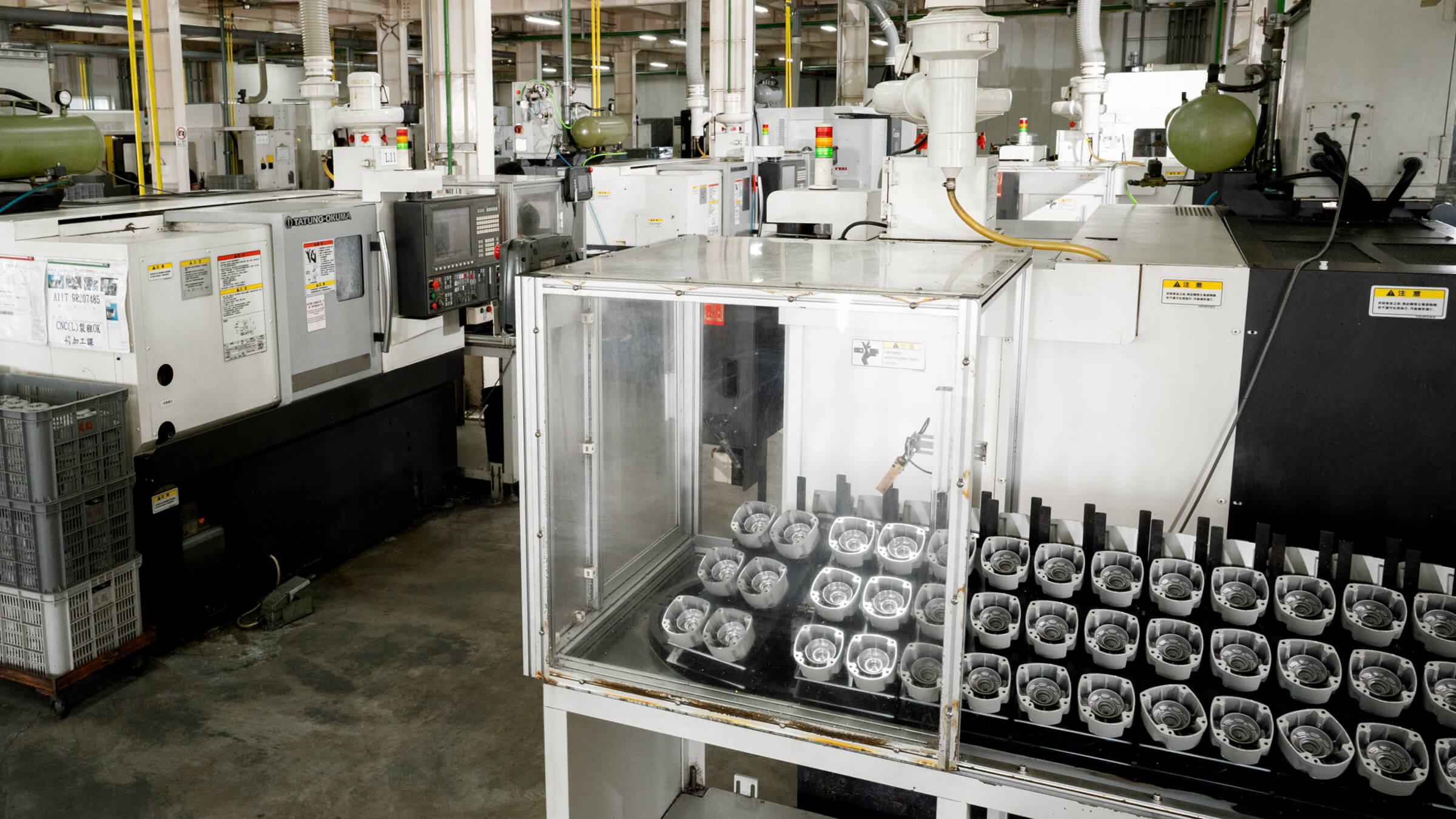 Automated CNC machining facility at JoinCast featuring a row of high-precision lathes for mass production of aluminum die cast components.