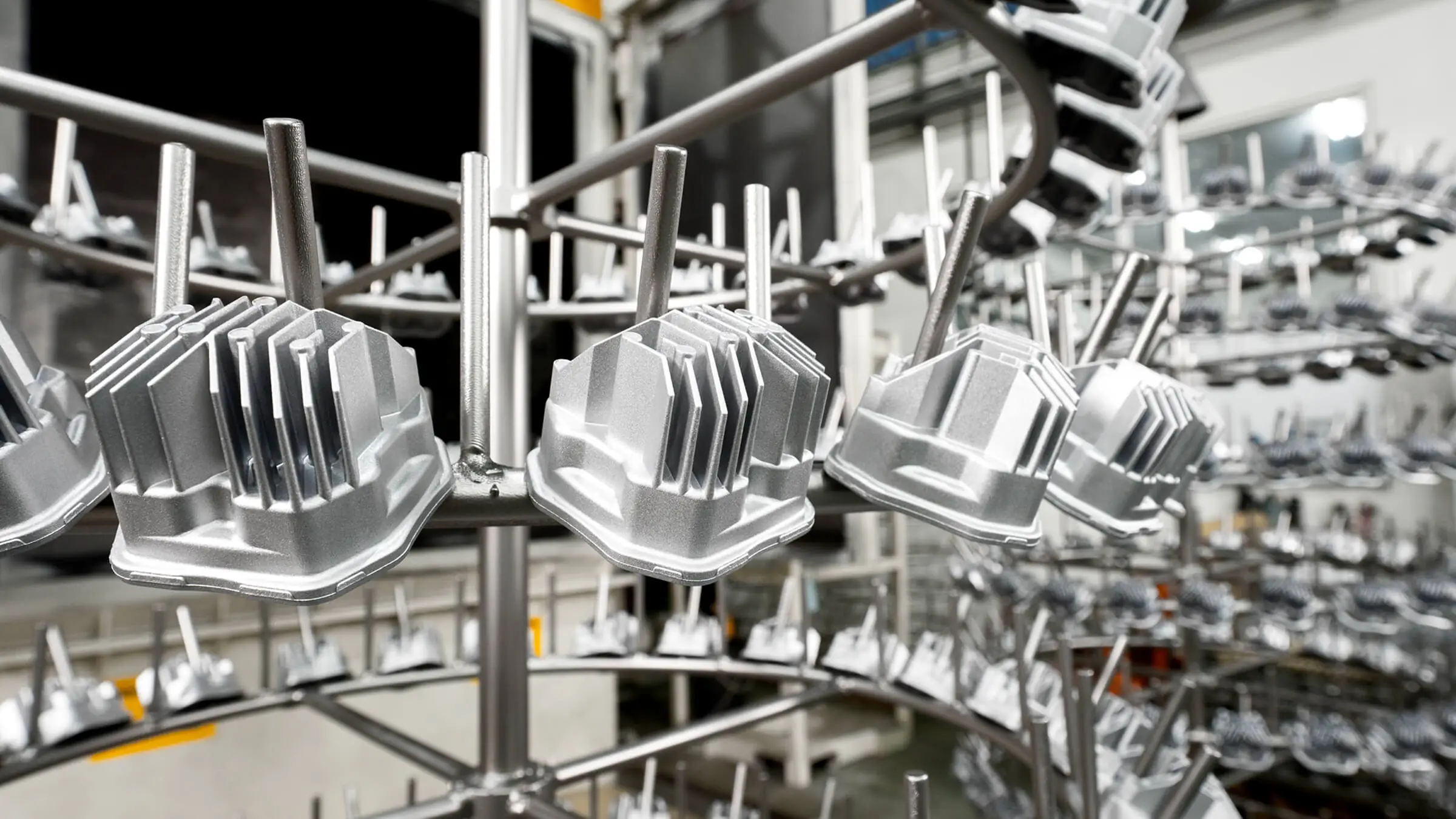 Automated shot blasting system at JoinCast’s Taiwan facility providing uniform surface texturing and scale removal for mass-produced aluminum components