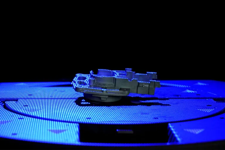 Advanced 3D blue light scanning for automated surface analysis and geometric validation of complex aluminum die cast assemblies.