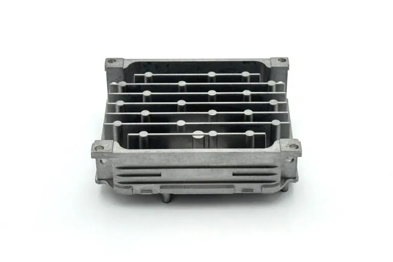 Front view of a vertically integrated die-cast heat sink with precise mounting interfaces tailored to specific thermal assembly requirements.